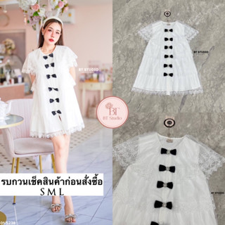 เดรสสั้นลูกไม้ชีฟองแต่งระบาย 4 ชั้น ช่วงแขนปิดต้นแขน ตรงกลางแต่งโบสีดำเรียงแถวตรงกลางแต่งมุก งานสวยมีซับใน เนื้อผ้าดี มี