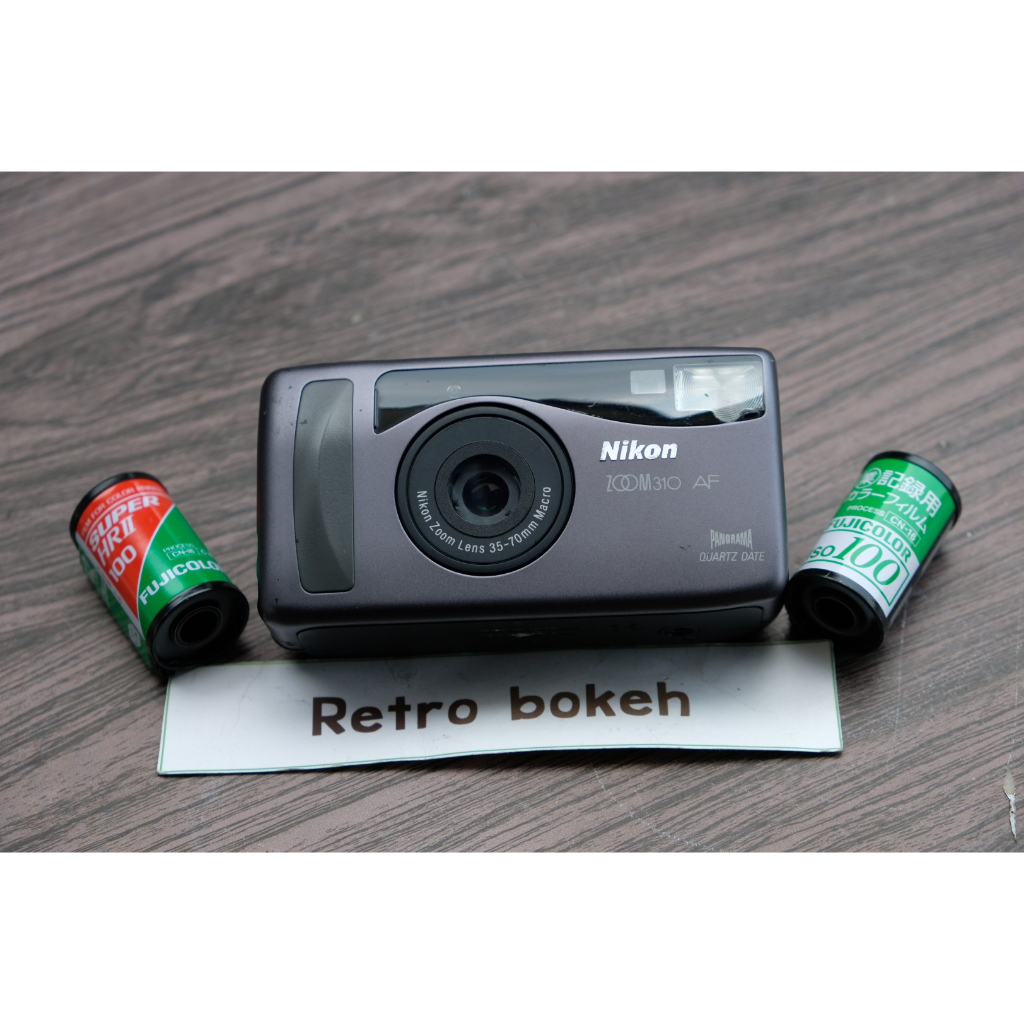 กล้องฟิล์ม Nikon Zoom 310AF เลนส์คม ระยะ 35mm - 70mm สภาพดี ตัวเล็กแต่สเปคดีมาก ช่องมองปรับสายตาได้ ใช้งานง่าย เล็งแล้วถ