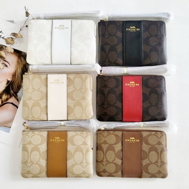 แท้ % Small Wristlet In Signature คล้องมือ 1 ซิป S
