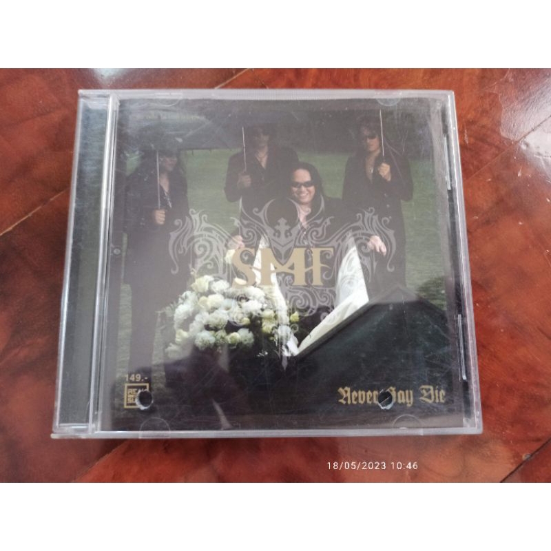 ซีดีเพลง cd music หิน เหล็ก ไฟ SMF Never Say Die แผ่นตัวอย่าง