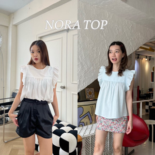 Nora top - เสื้อแขนกุดแต่งระบายข้าง ตัวยาว มีดีเทลลายผ้า (nita.bkk)