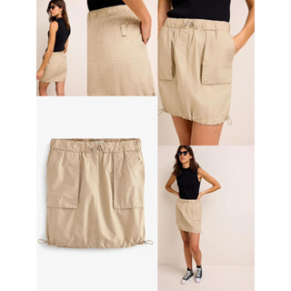 Next Utility Cargo Mini Skirt  กระโปรงทรงคาโก้ เอวยางยืดมีเชือกผูกเอว ชายกระโปรงมีเชือกรูดปรับได้ กระเป๋าล้วง 2 ข้าง