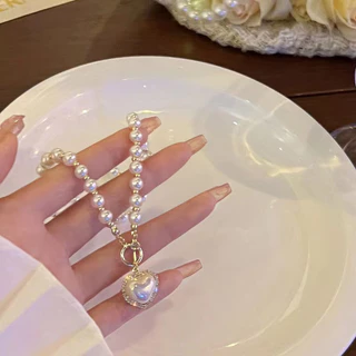 สร้อยคอโชคเกอร์จี้หัวใจคริสตัลไข่มุกสไตล์ ประดับไข่มุก มีหลายชั้น แฟชั่นสําหรับผู้หญิง