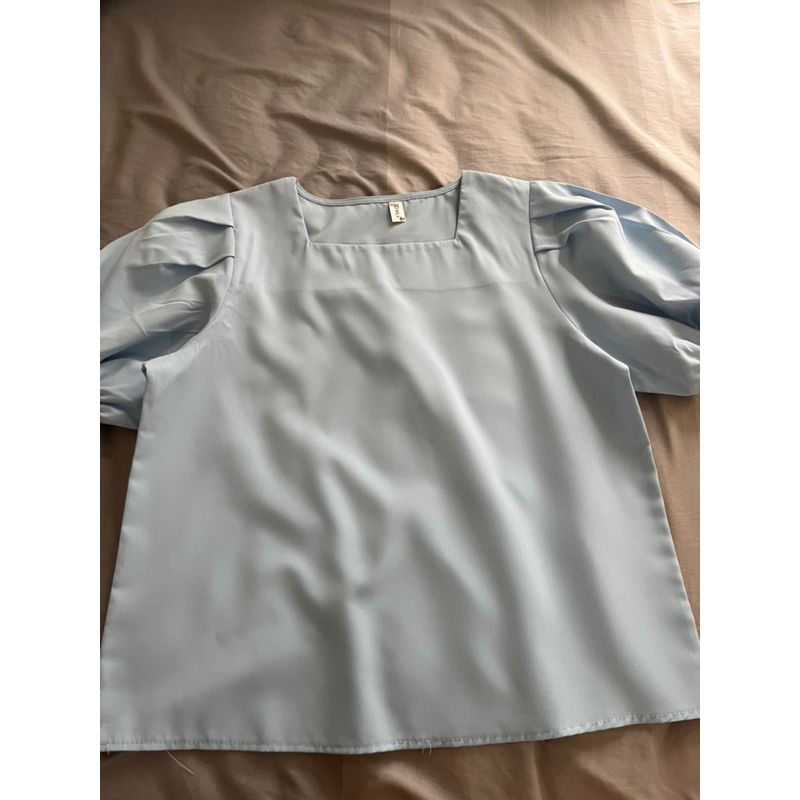 เสื้อสีฟ้า จาก TikTok shop