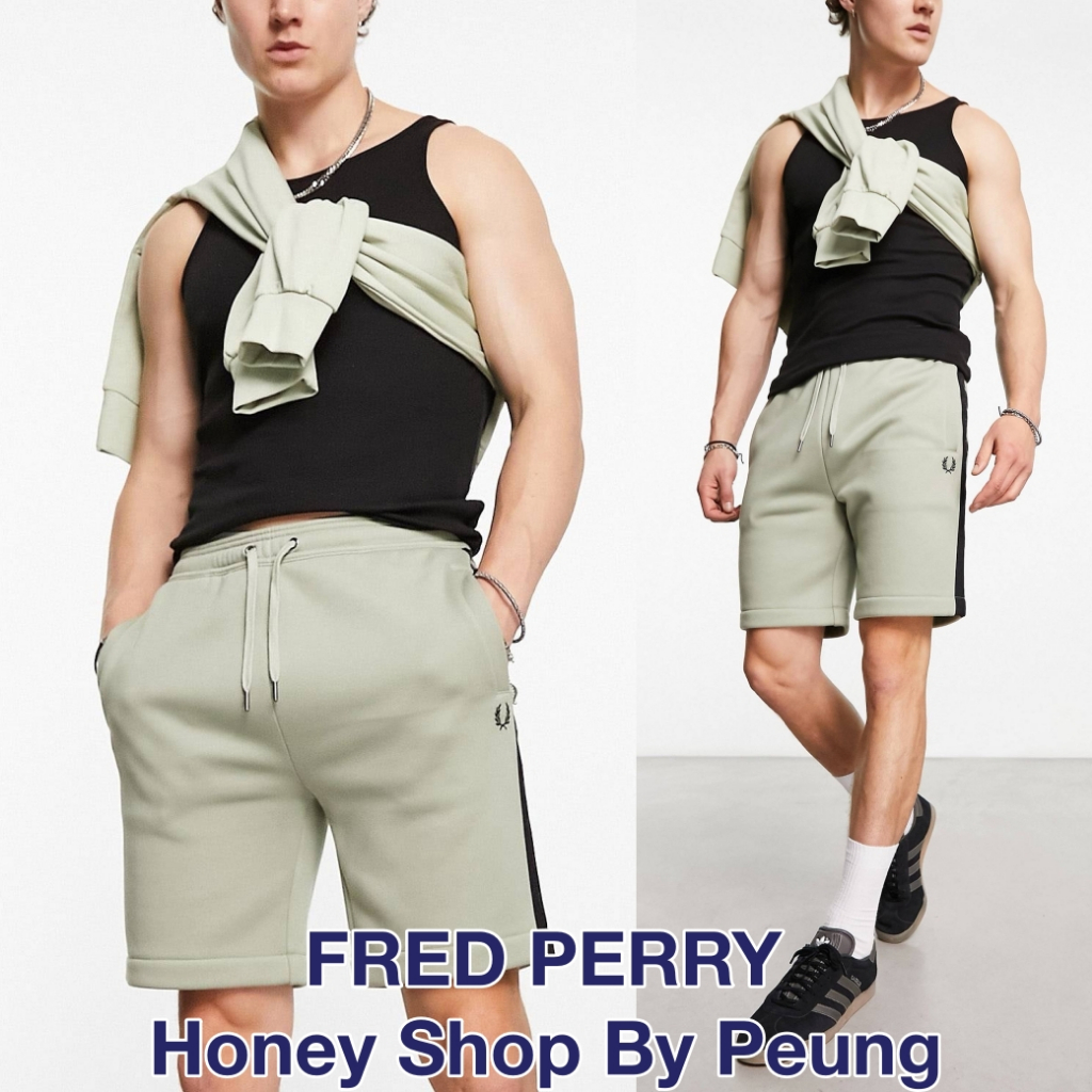 [เก็บโค้ดลด 30% ของแท้ พร้อมส่งในไทย] Fred Perry Emboss Laurel Short Col : Seagrass (AW23 กางเกงขาสั