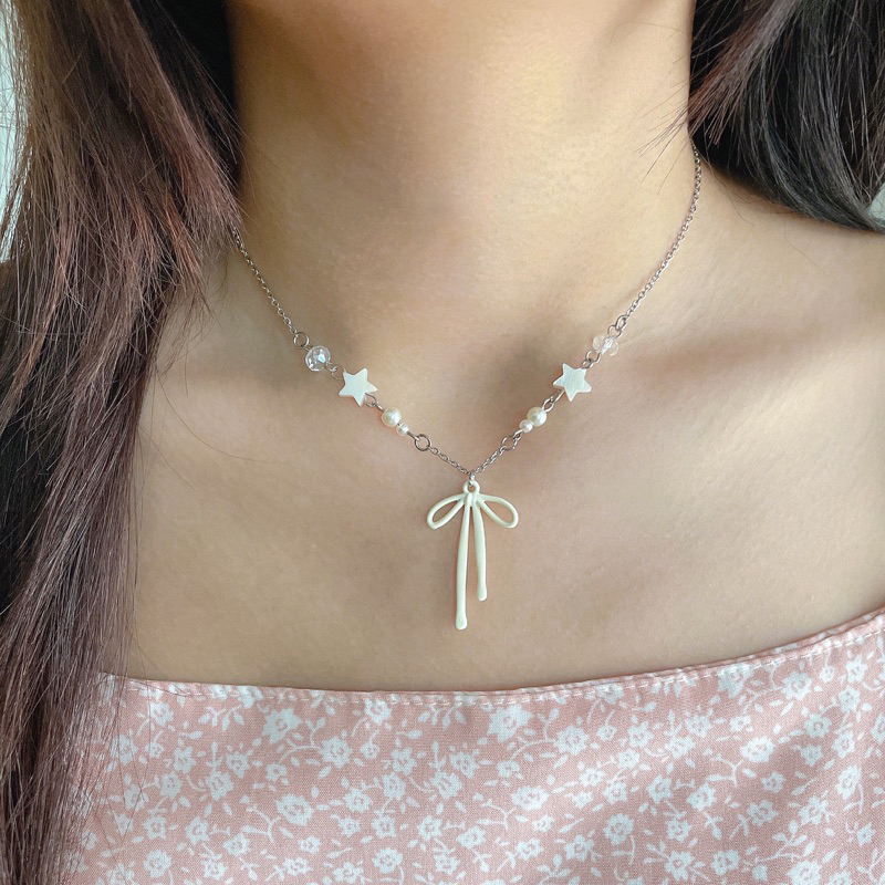 พร้อมส่ง white ribbon (สร้อยโบว์ขาวกับดาวมุก)มีสีอื่นด้วยค่า