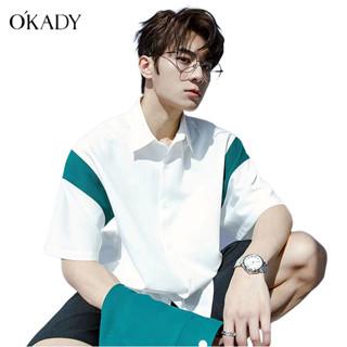 OKADY เสื้อเชิ้ตผู้ชายแฟชั่นเกาหลีลายทางลำลองแขนสั้นเสื้อคู่รุ่นอินสไตล์แจ็คเก็ตธุรกิจเนื้อผ้าคุณภาพสูง