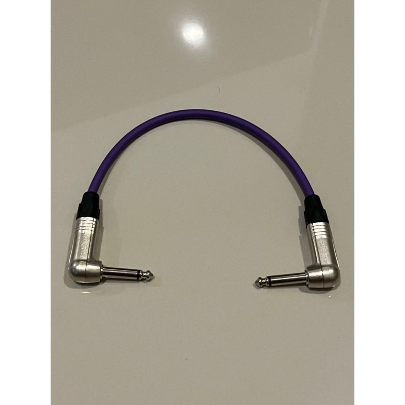 สายTSโมโนแบบงอ2ด้านทำจากสายชีลสเตอริโอของDynacomหัวของLidge