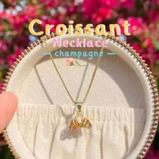 Champagne croissant necklace