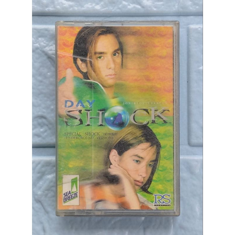 เทปเพลง RAPTOR (แร็พเตอร์) : DAY SHOCK [อย่าพูดเลย, แรงบันดาลใจ, Let's Live for Today, I'll Never Da