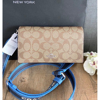 (ผ่อน0%) กระเป๋าสะพายข้าง Coach Anna Foldover Clutch Crossbody In Signature Style CJ649 ลายซีสีน้ำตาล สายสปอร์ตสีน้ำเงิน