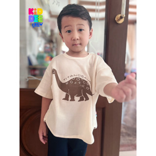 KiddeeCrew เสื้อเด็กแขนสั้นสีครีมขาวเล็กไดโนเสาร์ เป็นผ้าวาฟเฟิล เหมาะสำหรับอายุ 1-14 ปี