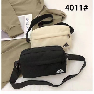 Adidasกระเป๋าสะพายข้างผู้ชายและผู้หญิงรุ่นใหม่（ขนาด: สูง 14ซม. กว้าง 23ซม. หนา 6ซม)