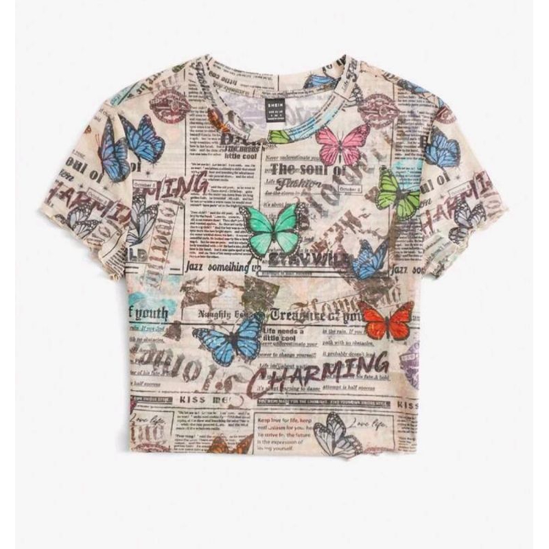 พร้อมส่งด่วนจากไทย  เสื้อครอป เสื้อแขนสั้น ผ้าโปร่ง ผ้าซีทรู ผ้าตาข่าย สีเนื้อ ลายผีเสื้อ หนังสือพิมพ์