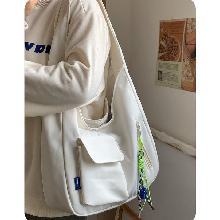 กระเป๋าสะพายไหล่ กระเป๋านักเรียน ผ้าแคนวาส ขนาดใหญ่ จุของได้เยอะ เข้ากับทุกการแต่งกาย สําหรับผู้หญิง และนักเรียน - รูปที่ 7