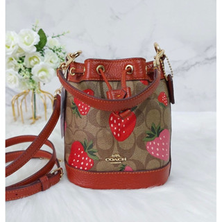 🎀(สด-ผ่อน) CH164 MINI DEMPSEY BUCKET BAG IN SIGNATURE CANVAS WITH WILD STRAWBERRY PRINT