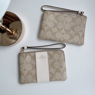 คล้องมือ1 Zip S COACH F58035 
IM/LIGHT KHAKI CHALK