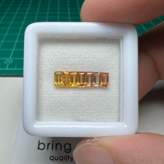 พลอยส้ม (orange sapphire) เผ่าbe 1.49 ct ขนาด 4.2 x 2.3 มม. จำนวน 7เม็ด เหลี่ยมบาเก็ต