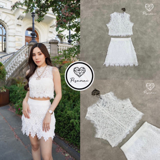 ราคาถูกที่สุด!! PISAMAI เซ็ตเสื้อแขนกุดลูกไม้ฉลุสีขาว มาคู่กับกระโปรงตีเกร็ด