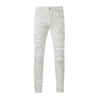 AMIRI white hole patch micro-elastic small feet slim-fit jeans