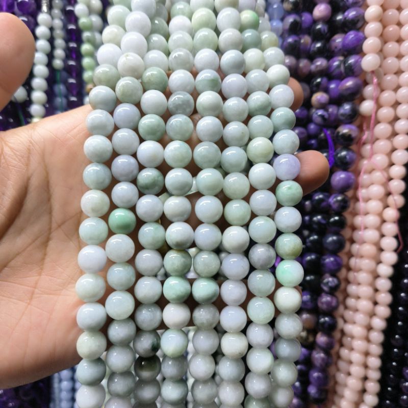 หยกพม่าแท้ธรรมชาติ หินเส้นยาวขายส่งความยาวประมาณ38cmร้อยได้2วงข้อมือหินมงคลนำโชคราคาส่ง