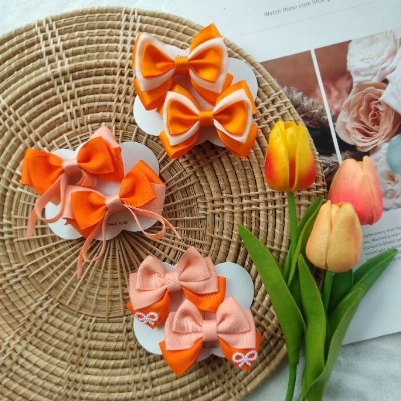โบว์ติดผมยางมัดผมโทนสีส้มแสด🧡(ราคา/1คู่)