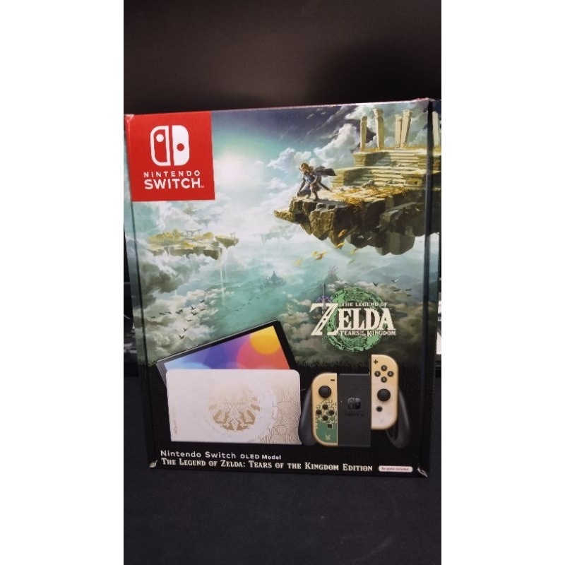 Nintendo switch oled model Zelda limited edition - มือสอง สภาพดี, แถมอะแดปเตอร์ hdmi เป็น vga, และปลั้กแปลง