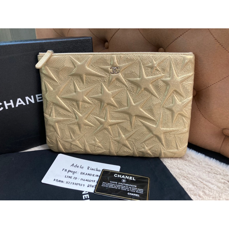 Chanel O Case Clutch Star Embossed Lambskin
