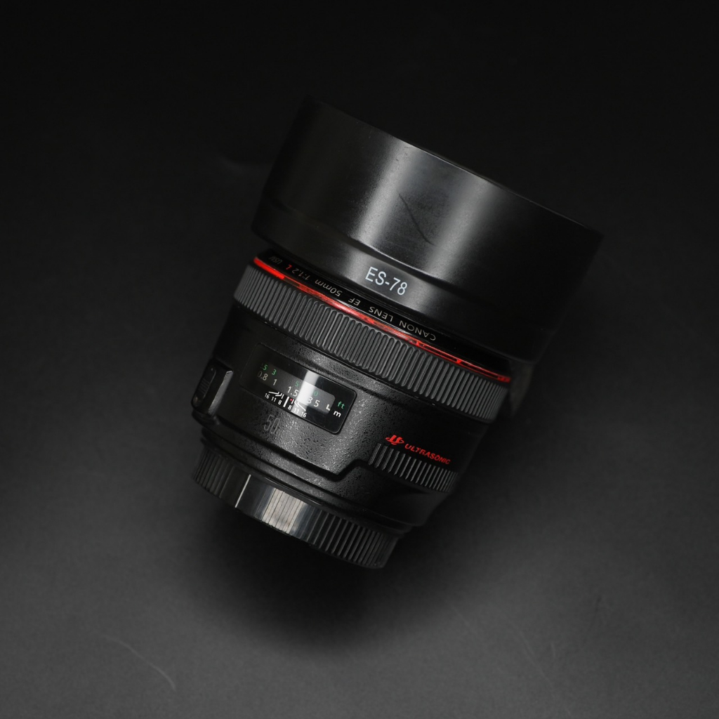 Canon 50mm F1.2L รหัส UZ ใช้งานได้ปกติ สภาพตามรูป  อุปกรณ์ที่จะได้รับ ตัวเลนส์ + Hood + ฝาปิดหน้าปิด