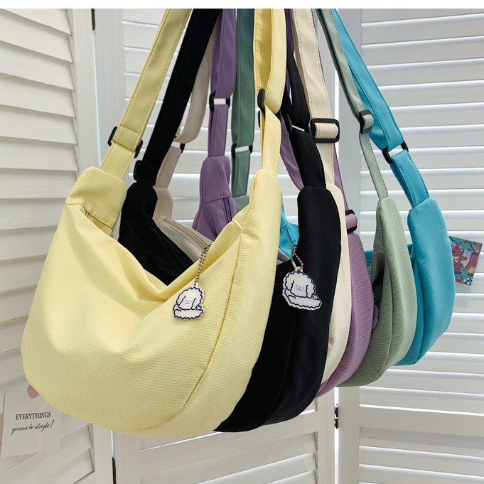 xspeedfashion(X1833) กระเป๋าสะพายข้างผ้าไนล่อนสีพื้นลายเส้น สไตล์เกาหลี(ไม่มีที่ห้อยแถม)