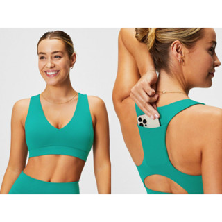 Fabletics On-The-Go Midi Medium Impact Sports Bra สปอร์ตบาร์ คอวี  พร้อมช่องใส่โทรศัพท์ สีเขียว