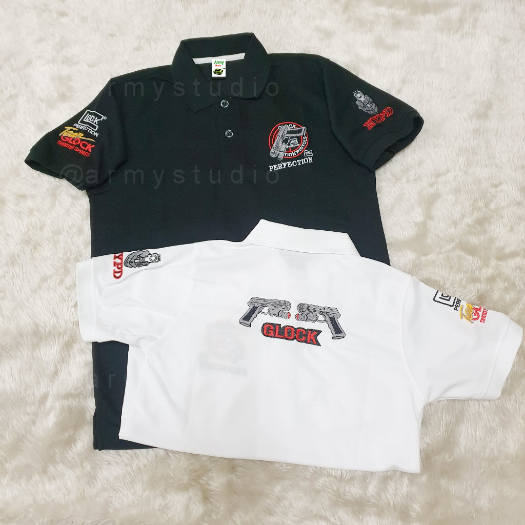 เสื้อยืดคอโปโลปักลายรูปปืน ปัก 4 จุด อก หลัง แขนสองข้าง คละลาย ใส่ได้ทั้งผู้ชาย ผู้หญิง มีไซร์S-3XL