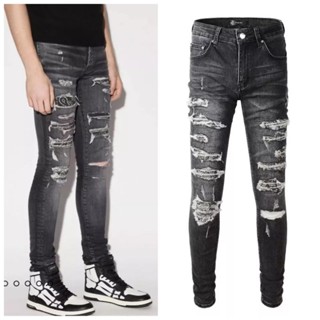 Amiri folded stitched ripped jeans