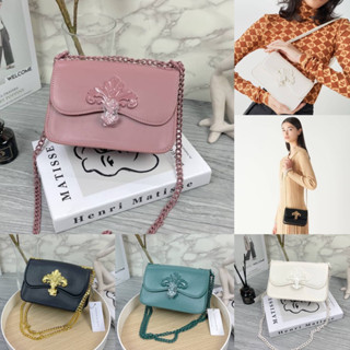 ชอค Meriah Chain Strap Crossbody Bag