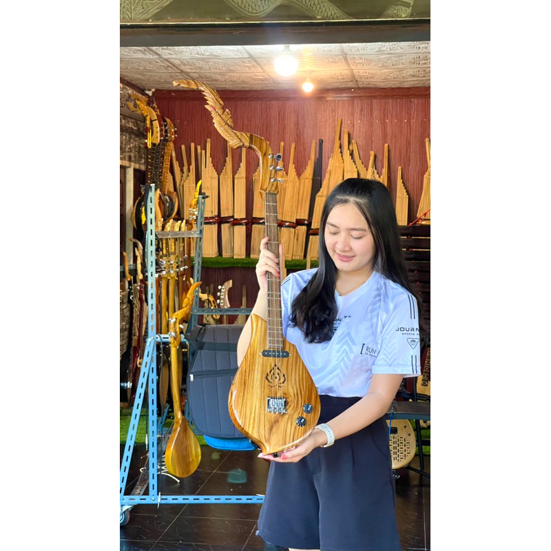 [สินค้าใหม่] พิณ พิณโปร่งไฟฟ้า ไม้สัก แถมเครื่องตั้งสาย สายสะพาย สายแจ็ค หนังสือและปิ๊กดีด ราคา ถูกที่สุด ดีลบีเคเค แกลเลอรีภาพที่ 4