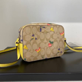 (ผ่อน0%) กระเป๋าสะพายข้าง Coach Mini Camera Bag In Signature Canvas With Dreamy Veggie Print 7 นิ้ว ลายซี สีเหลืองลายผัก