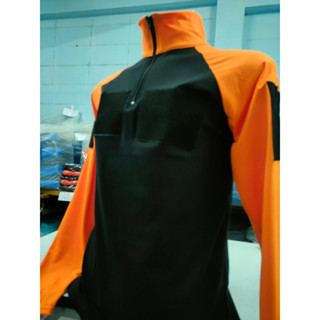 เสื้องานป้องกันติดตีนตุ๊กแก รุ่นสีดำแขนส้มอ่อน