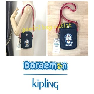 ส่งฟรี ไม่ใช่โค๊ด !! ของแท้ ✔ พร้อมส่งค่ะ ▪️ Size 6.6 x 4.3 นิ้ว ▪️🐒 KIPLING X DORAEMON TALLY CROSSBODY PHONE BAG