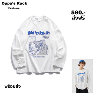 เสื้อแขนยาวสีขาวสกรีนลายจรเข้