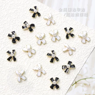 โบว์เพชรตกแต่งเล็บ​10ชิ้น​