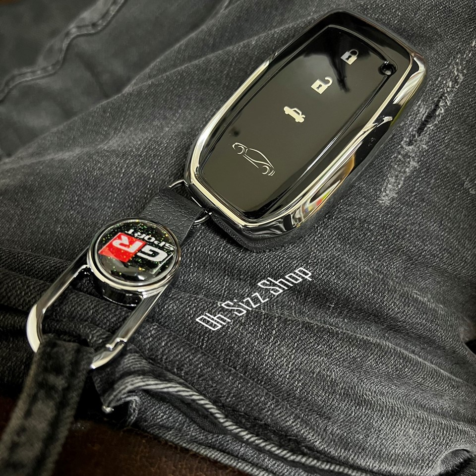 เคสรีโมทรถ Toyota Revo GR Fortuner Leader 2023 ฝาปุ่มหน้าครอบปุ่มดำ ปุ่มโลโก้รถ ด้านหลังฝาใสดำเห็นโลโก้ตัวรีโมท (TPU Ke