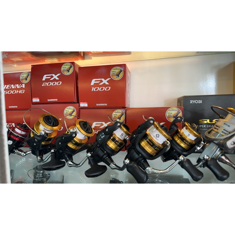 รอก Shimano FX New  สปูนทอง / เบอร์ 1000-4000