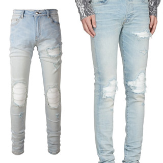 AMIRI light-colored white knife cut hole jeans paint slim feet