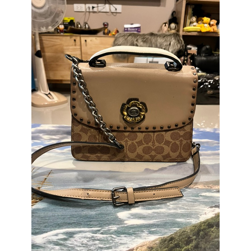 Coach สายโซ่ลายดอกไม้ ของลุ้น
