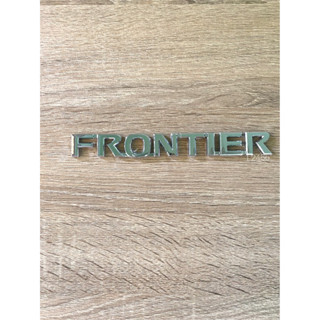 โลโก้ FRONTIER ขนาด17.5cm.x2cm. NISSAN NAVARA 1990-2017