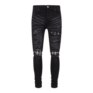 AMIRI black and white knee patch black slim jeans