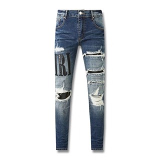 AMIRI summer blue hole patch jeans