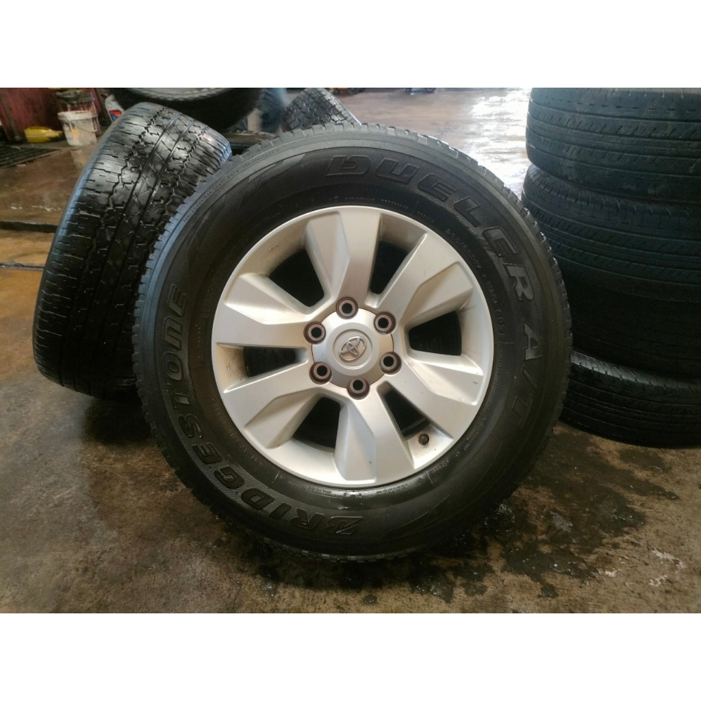 ล้อแม็กซ์แท้ถอด TOYOTA REVO ขอบ 17x7.5" 6รู139.7 ET30 พร้อมยางถอดสภาพพอใช้ BRIDGESTONE D693 AT (ราคา