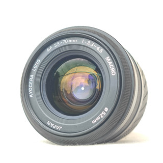 เลนส์ออโต้ ยี่ห้อ Kyocera af 35-70mm f3.5-4.5 Macroเมาท์ Af kyocera บอดี้ดำ หน้าเลนส์ขนาด 52 มม.