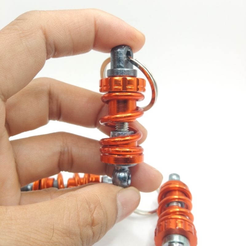 พวงกุญแจโช๊คอับ พวงกุญแจเท่ๆ ส่งจากประเทศไทย